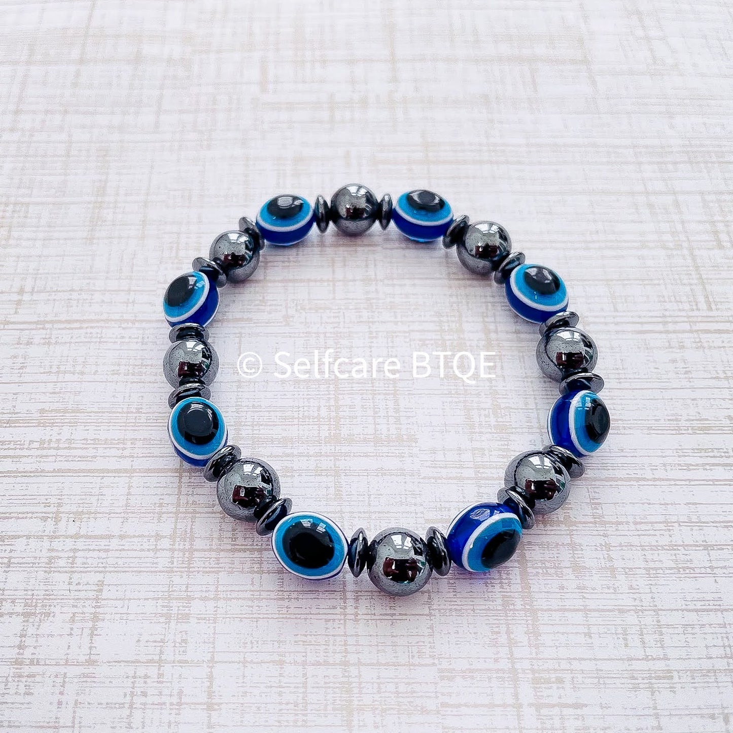 Blue Evil Eye and Hematite Beaded Bracelet | 8mm