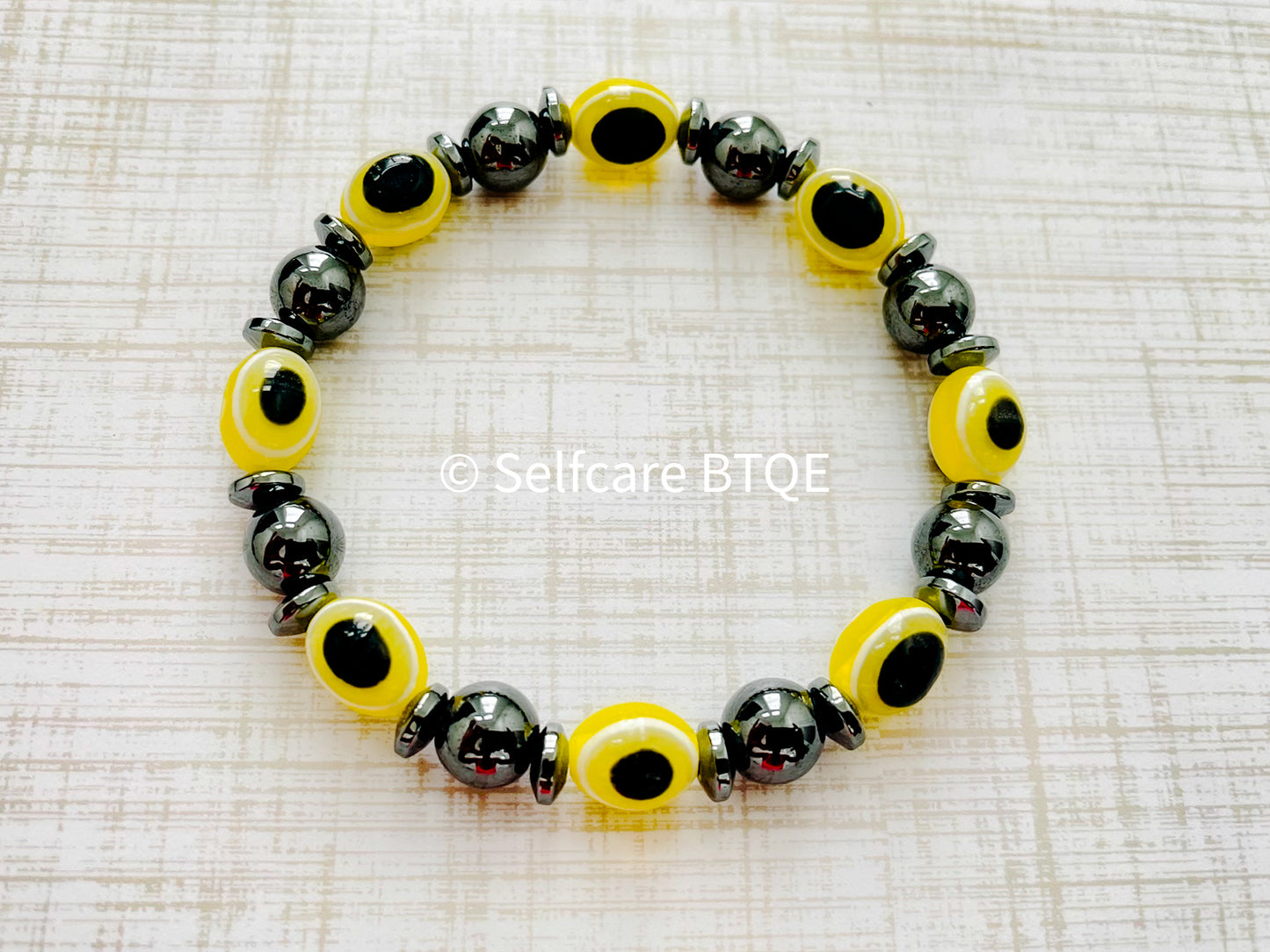 Yellow Evil Eye and Hematite Beaded Bracelet | 8mm