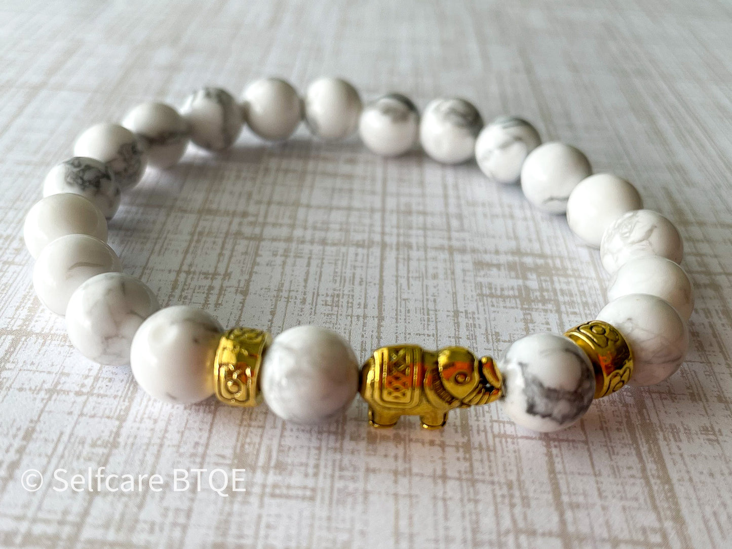 The Gentle Giant: White Turquoise & Golden Elephant Bracelet