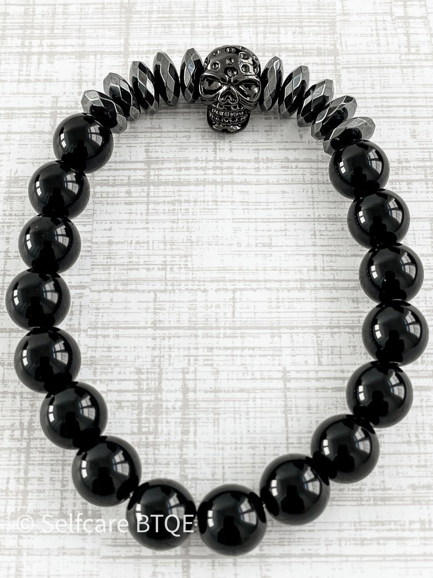 Skull Bracelet with Hematite & Frosted Black Agate Stones