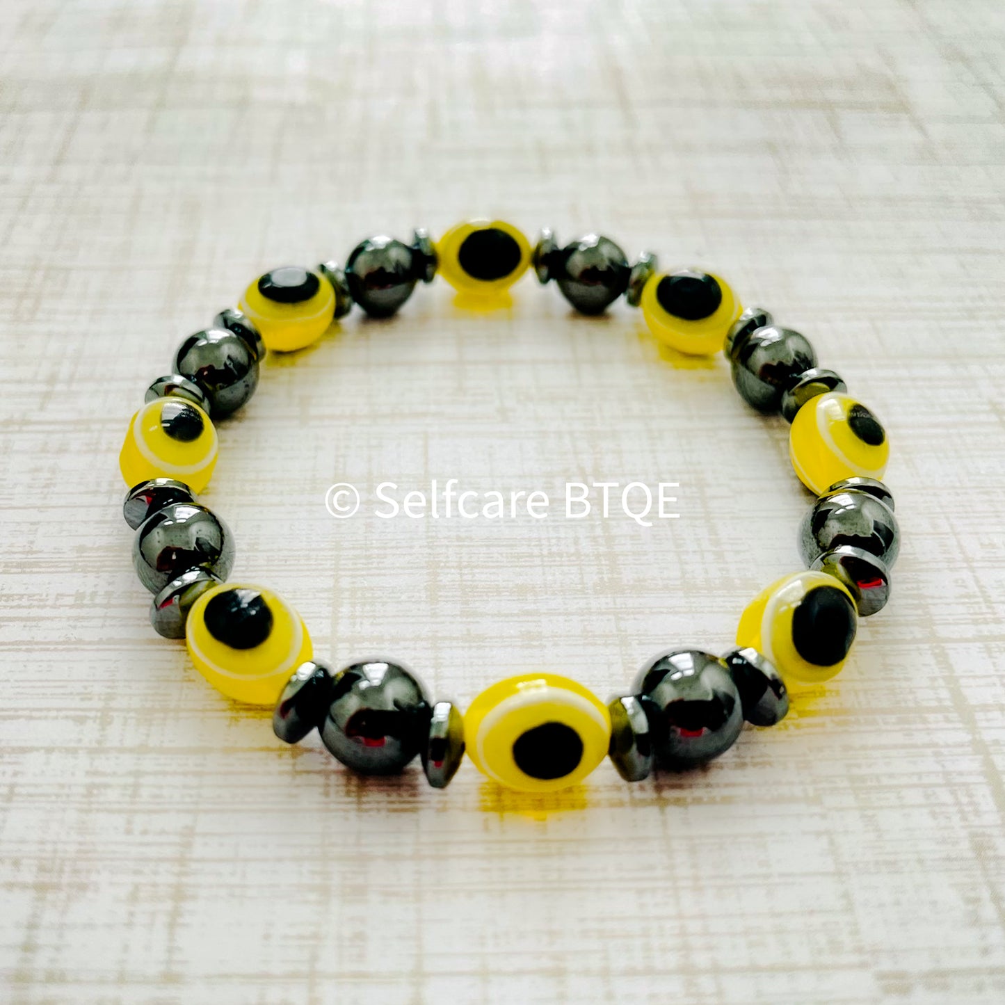Yellow Evil Eye and Hematite Beaded Bracelet | 8mm