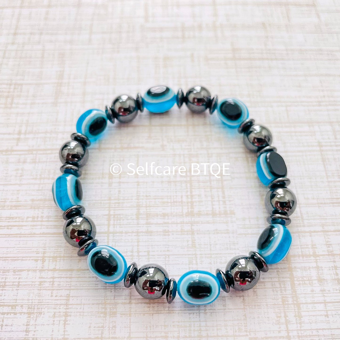 Blue Evil Eye and Hematite Beaded Bracelet | 8mm